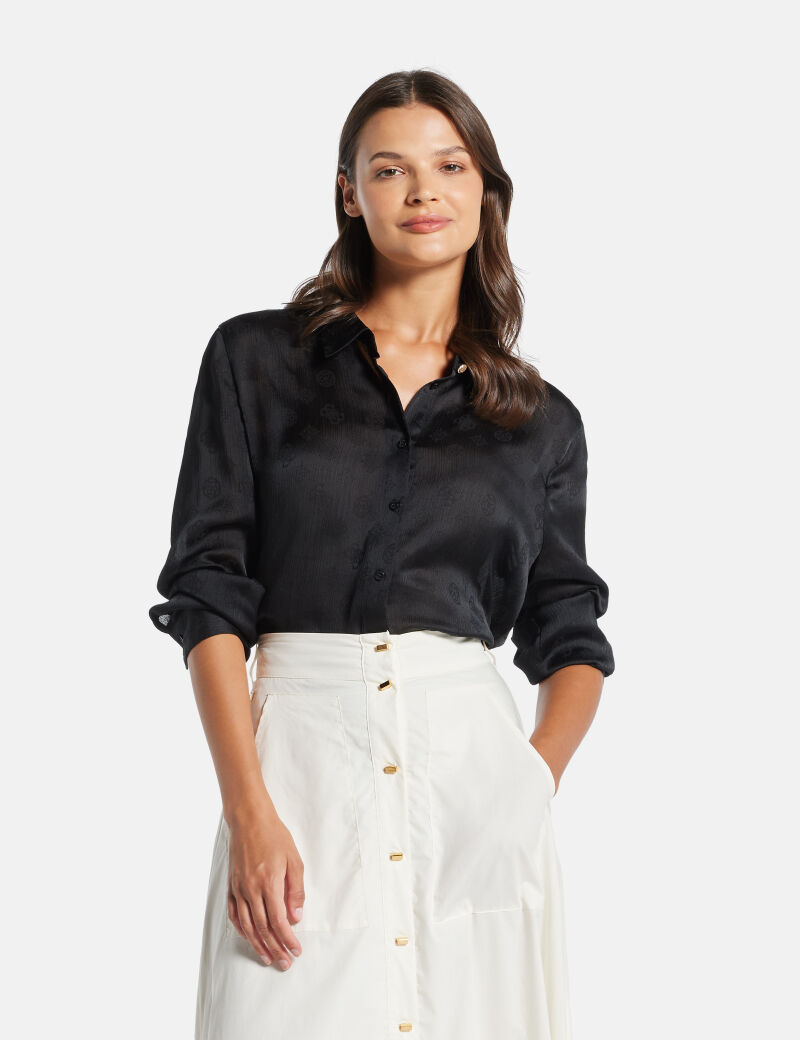 قميص بشعار 4G وزهرة الفاوانيا